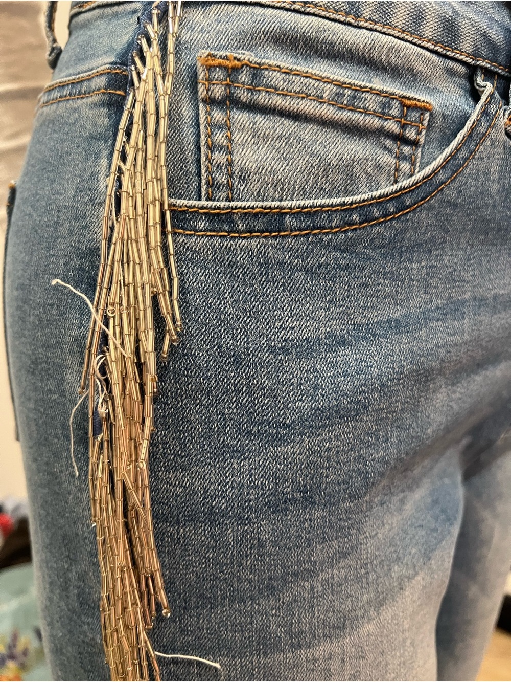 Classic Light Blue Women’s Jeans with Beaded Tassel